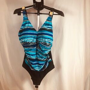Your best look swimming suit women size 18 w Blue striped with black bottom.